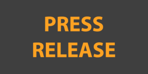 Press Release graphic with bold orange text on a dark background.